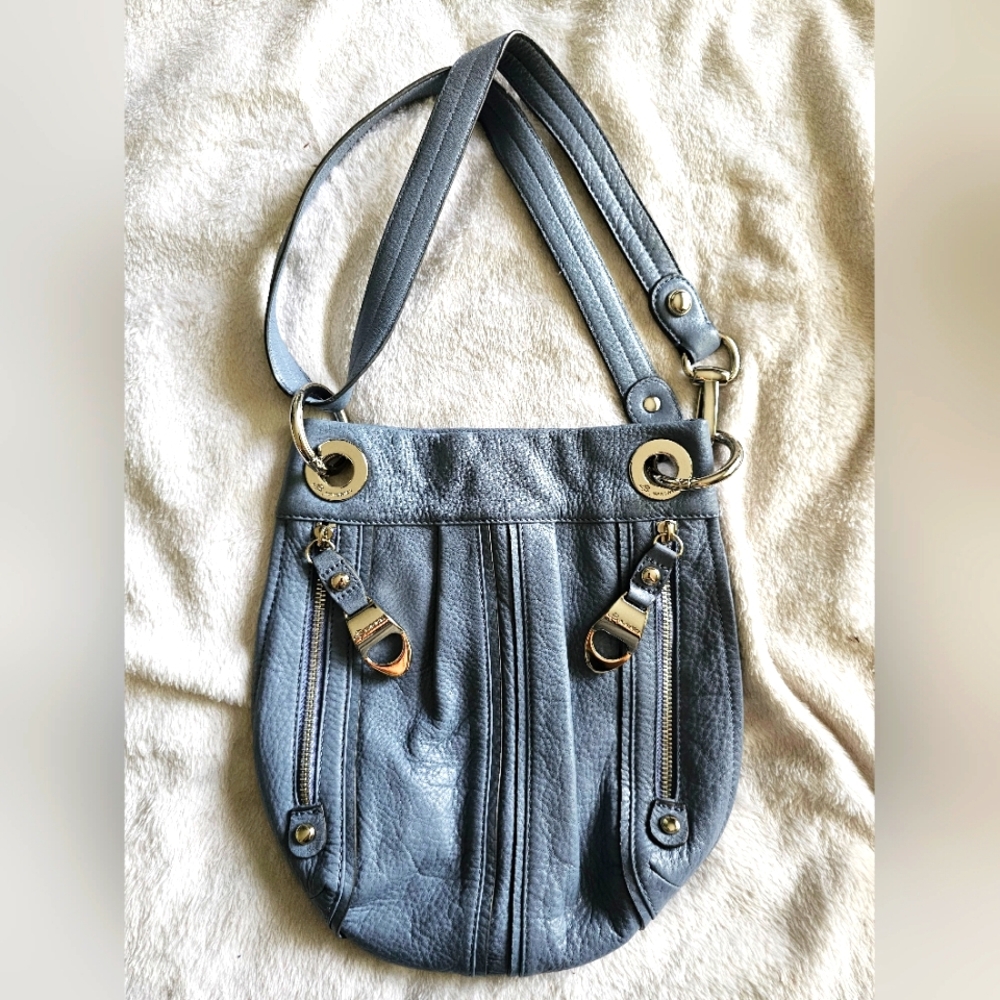 B. Makowsky gray/blue pebbled leather crossbody bag.